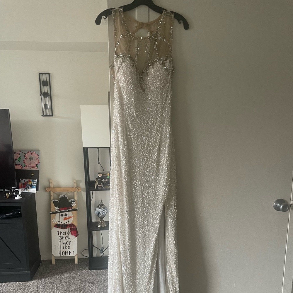 Elegant Beaded Gown with Sheer Neckline